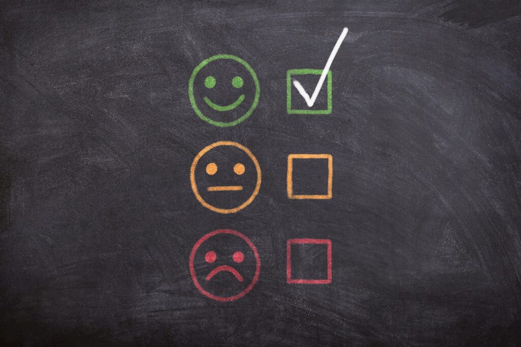 chalkboard feedback faces with happy face marked