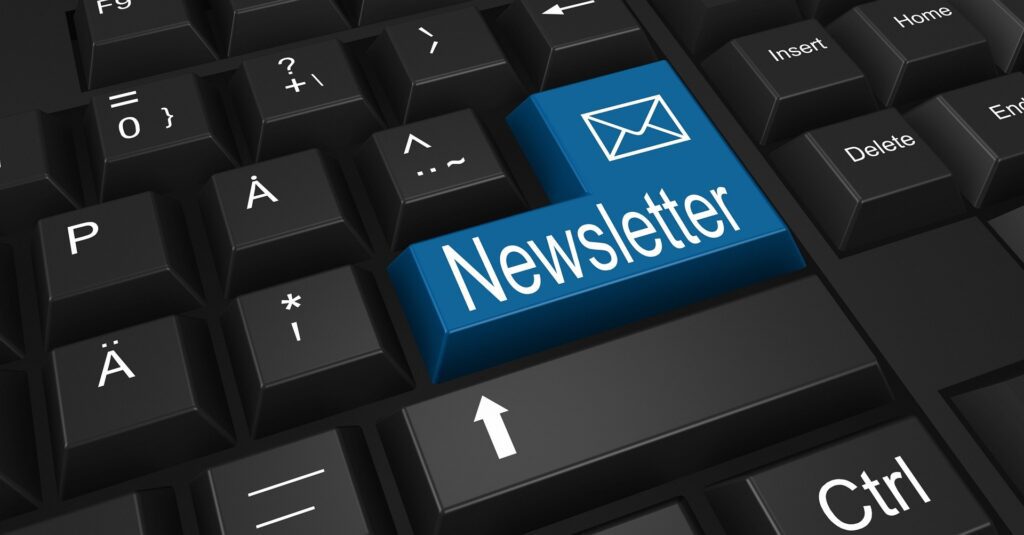 A newsletter key with mail symbol on a keyboard for email marketing