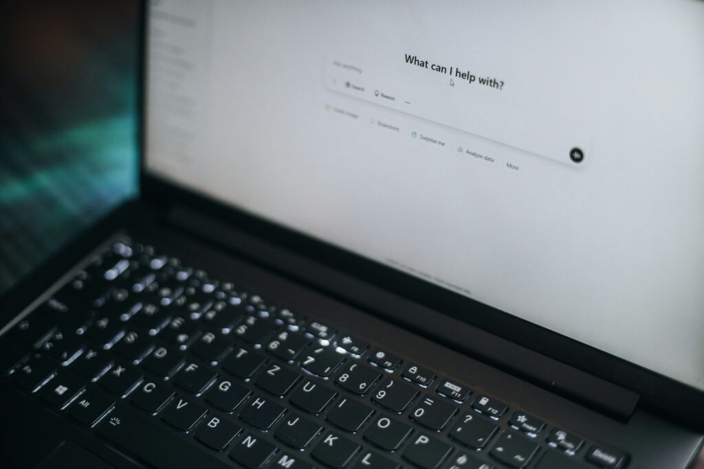 The ChatGPT writing assistant open on the screen of a laptop.