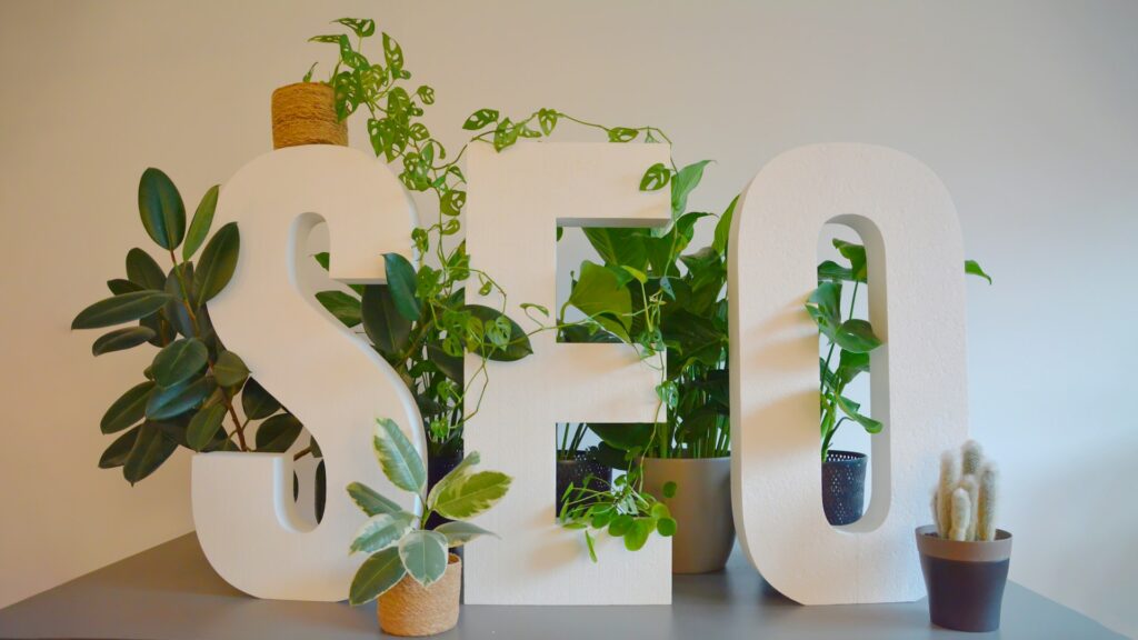 SEO plaque with plants making us contemplate if SEO is still relevant.